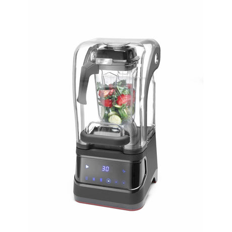 Ein HENDI Mixer mit geräuschdämmender Abdeckung - schwarz von HENDI, gefüllt mit gehacktem Gemüse, steht auf weißem Hintergrund. Der digitale Standmixer hat die Anzeige "30" und sichtbare Bedienknöpfe am Sockel.
