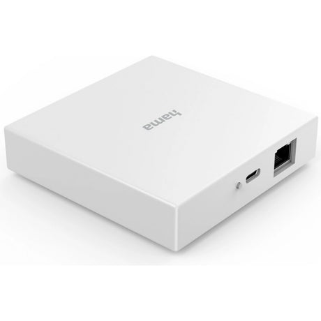 Ein weißer, quadratischer Hama Smart-Home-Hub von Hama mit USB-C- und Ethernet-Anschlüssen auf einer Seite wird auf einer weißen Fläche gezeigt.