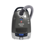 Der Hoover ATC 18 LI Kabelloser Bodenstaubsauger ist ein grauer kabelloser Staubsauger mit einem oberen Griff, einem angebrachten Schlauch, Bedienknöpfen an der Vorderseite, Filtereinstellungen und dem Hoover-Logo sowie "Athos Careless" und "18 V Lithium-Ionen-Akku".