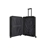 Der Travelite Next 4-Rollen-Trolley 67 cm (Schwarz, Aluminium) von Travelite steht aufrecht auf vier Rollen, mit Innenfächern, Gurten und einem TSA-Zahlenschloss im schwarzen Hartschalendesign.