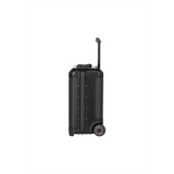 Der Travelite Next Business Wheeler (Schwarz, 34L, Bordgepäck) von Travelite ist aufrecht mit ausgezogenem Aluminium-Trolleygriff abgebildet, von der Seite betrachtet vor einem schlichten weißen Hintergrund.