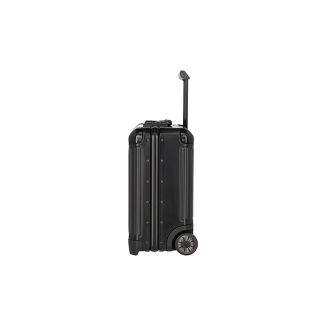 Der Travelite Next Business Wheeler (Schwarz, 34L, Bordgepäck) von Travelite ist aufrecht mit ausgezogenem Aluminium-Trolleygriff abgebildet, von der Seite betrachtet vor einem schlichten weißen Hintergrund.